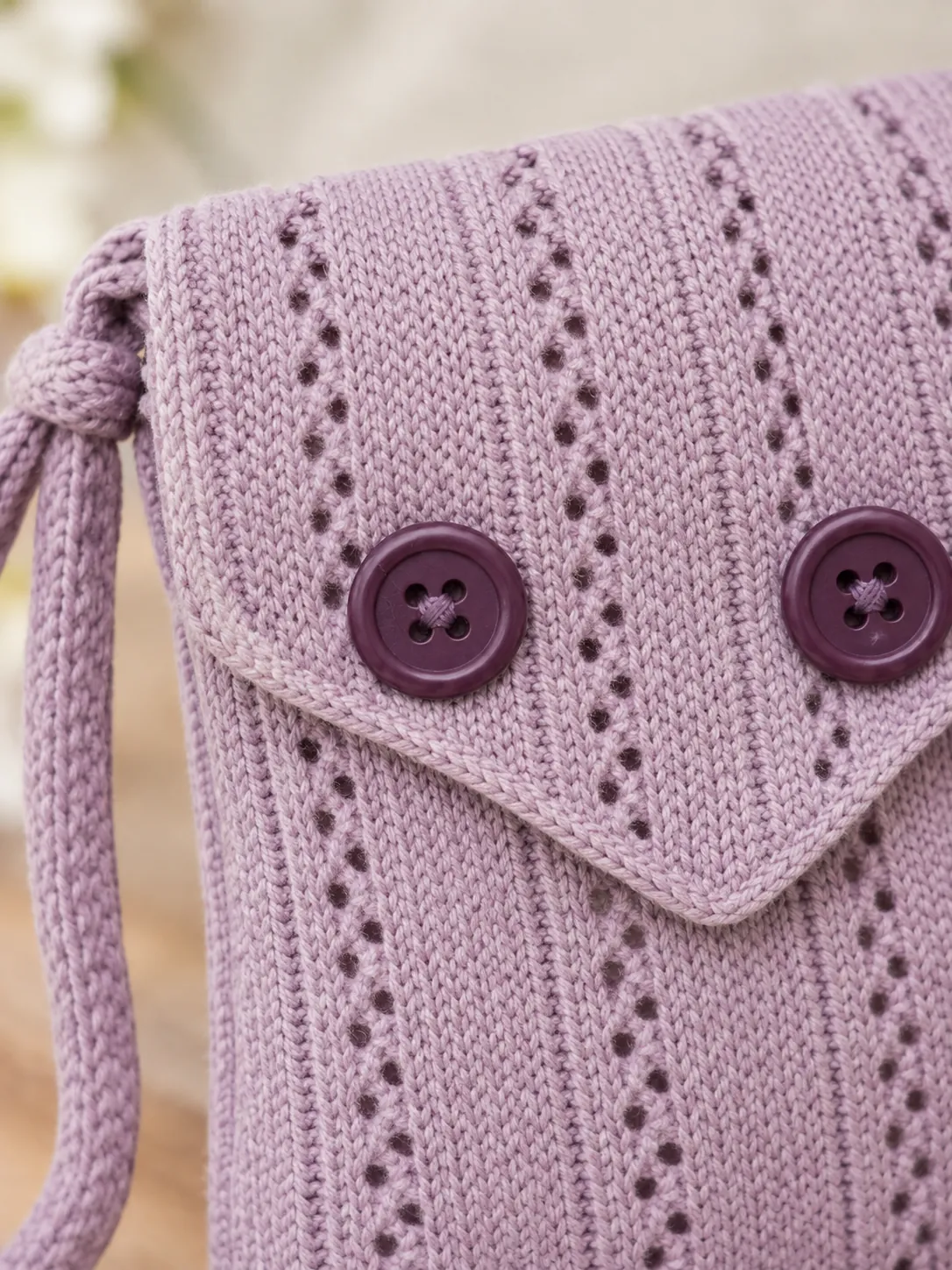 Pointelle Button Pouch, close-up of the join