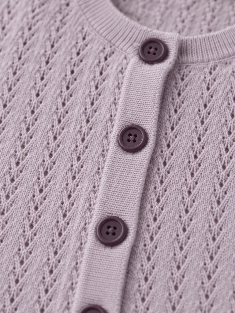 Fine Pointelle Cardigan, close-up of the join